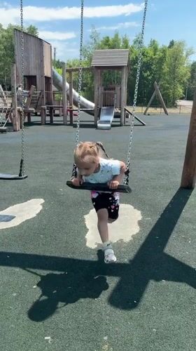 Playground session at a rubber-surfaced park in Gornye Kljuchi