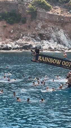 Pirate tour boat stop off Alanya's rocky coast