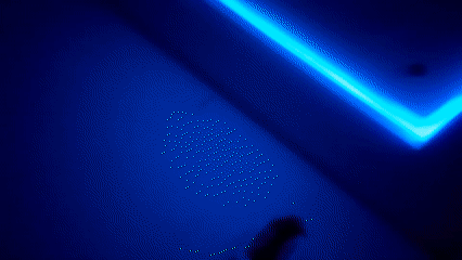 Blue purple LED lights documented in indoor installation