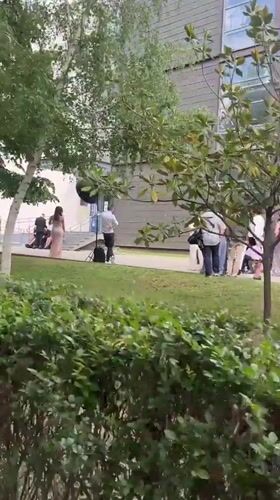 Formal outdoor gathering documented in Blagoevgrad park setting
