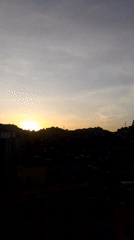 Dawn breaks over Caracas cityscape in multiple recordings