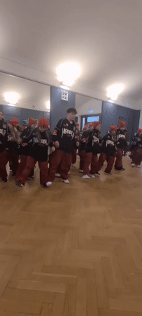 Dance rehearsals and nail polish selection documented in Riga studio