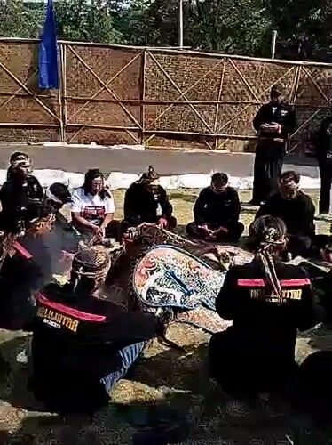 Traditional martial arts and ritual performance draws crowds in Mojogedang