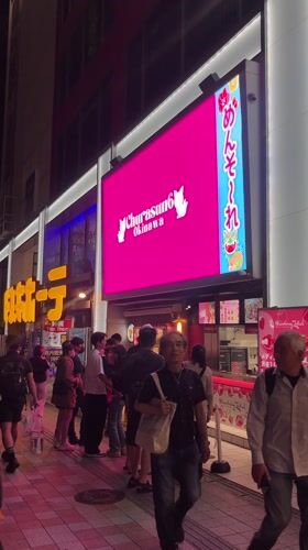 Nighttime street scene documented in Naha, Japan