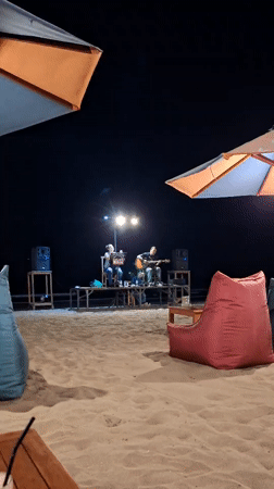 Live music and selfies at a Kuta beach night spot