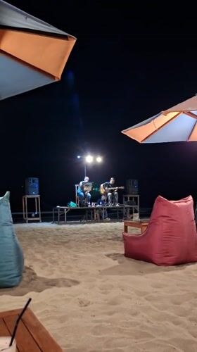 Live music and selfies at a Kuta beach night spot