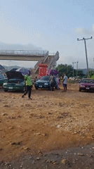 Vehicle breakdown draws crowd on Abuja street