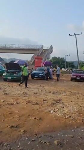 Vehicle breakdown draws crowd on Abuja street