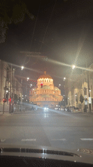 Evening scenes captured in Sofia featuring illuminated cathedral, aquarium