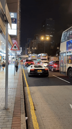 Lamborghini caught in Hong Kong traffic alongside public buses