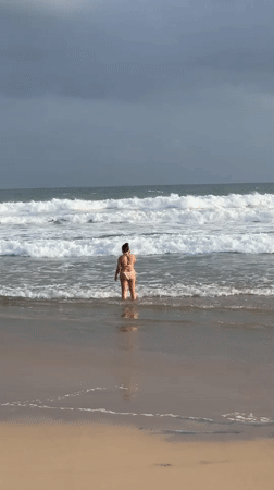 Surfers brave stormy conditions at Sri Lankan beaches