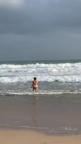 Surfers brave stormy conditions at Sri Lankan beaches