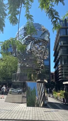 Prague's iconic reflective segmented head sculpture up close