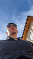 Young man films selfies outside in sunny Zlatograd
