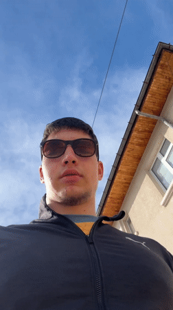 Young man films selfies outside in sunny Zlatograd