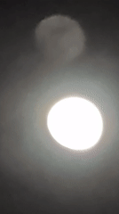 Mexico City resident films bright moon in night sky