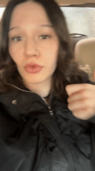 Woman records video message from car in Saint Petersburg