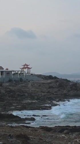 Coastal scenes captured at Mui Ne, Vietnam rocky shoreline