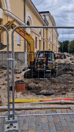 Street life, construction, and nature in a European city