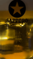 Sapporo beer and tabletop grill documented in Kutchan
