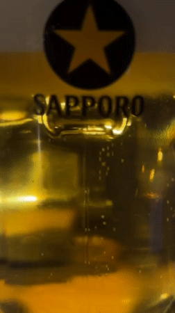 Sapporo beer and tabletop grill documented in Kutchan