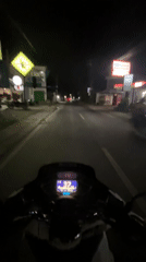 Nighttime motorcycle ride documented in Kuta Selatan, Indonesia