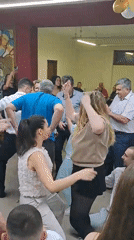 Community dance gathering held in decorated hall in Lokorsko