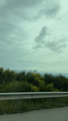 Couple's highway journey documented near Tserovani, Georgia