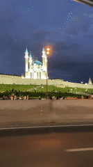 Evening gathering at illuminated Kul Sharif Mosque in Kazan