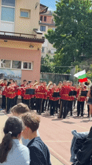 School marching band and dancers perform outdoor show in Pleven