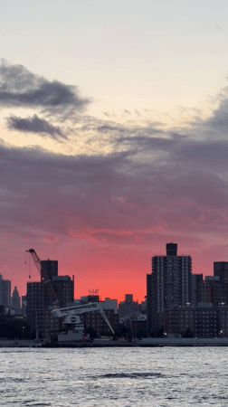 Dramatic sunset paints NYC skyline in vibrant colors