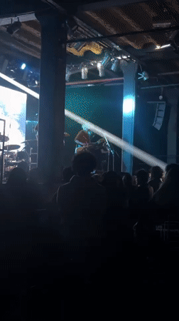 Late-night band performance captured at Buenos Aires venue