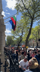 Crowd gathers at Bulgarian-flagged building in London