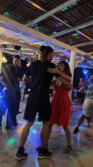 Couples dance at outdoor venue in Baan Tai, Thailand