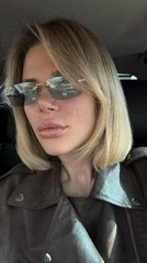Woman in sunglasses spotted in moving car in Gorno-Altaysk