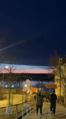 Evening scenes captured in Perm show pedestrians and urban construction
