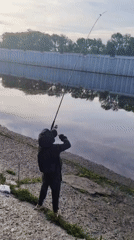 Father and child enjoy early morning fishing in Chaikovsky