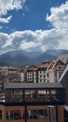 Mountain scenery captured in Bansko, Bulgaria under cloudy skies
