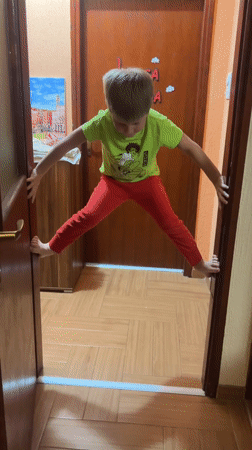 Child in cartoon shirt spotted in Podgorica doorway