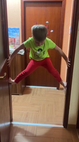 Child in cartoon shirt spotted in Podgorica doorway