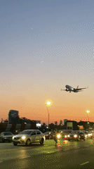 GOL flight lands at dusk as Buenos Aires residents gather