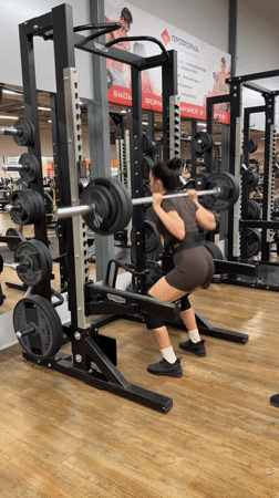 Barbell squats and pull-ups at a Chaikovsky gym