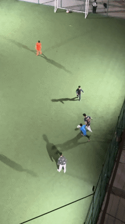 Nighttime aerial views capture soccer, traffic, buildings in Yerevan