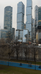 Moscow skyline filmed from elevated riverside position under overcast skies