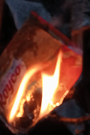 Flame observed burning on product wrapper in Indonesia