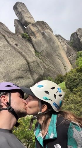 Climbers share romantic moment at Greece's Meteora rock formations