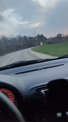 Motorist documents wet spring driving conditions near Sevlievo, Bulgaria