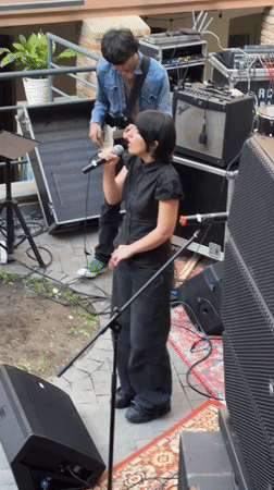 Live courtyard music, tattoo close-ups, and street-level architecture