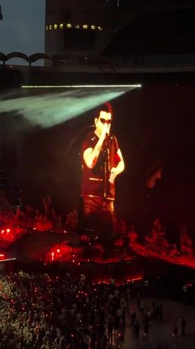 Live concert lights up San Siro in red