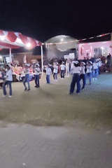 Outdoor night stage event with dance and live performance in Pemalang